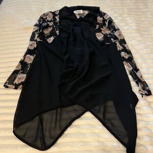 Good slip on light jacket to wear over a black t-shirt.